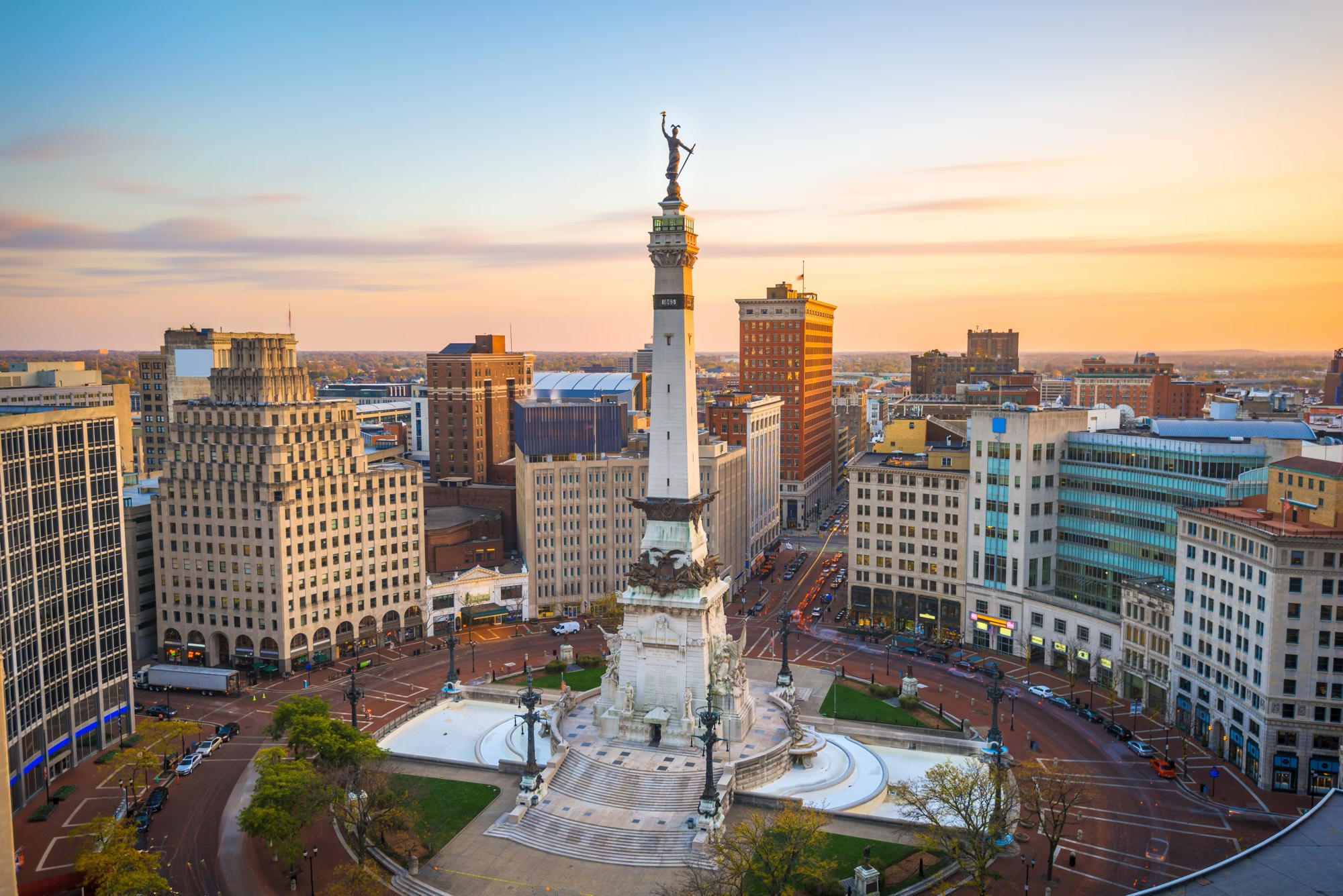 Monument Circle in downtown Indianapolis at sunset.
